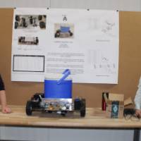 two seniors with their project